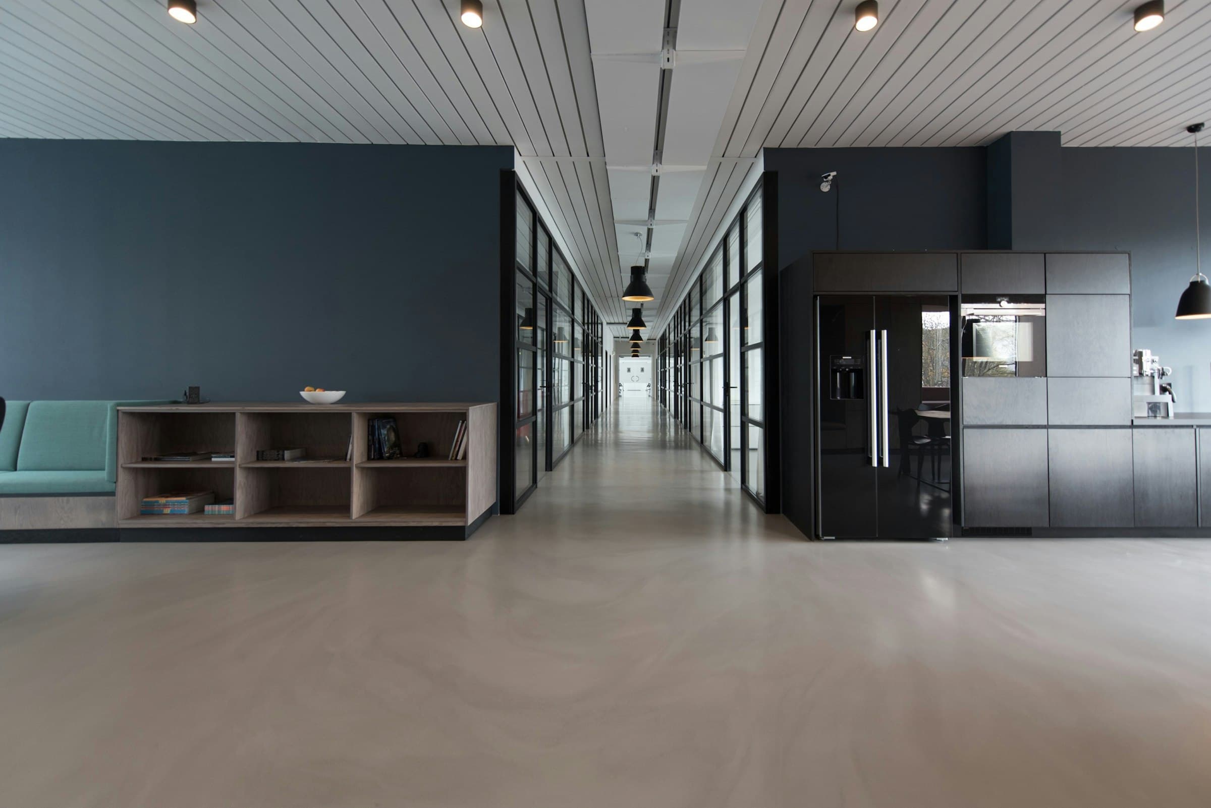 Commercial office interior with open workstations and daylight